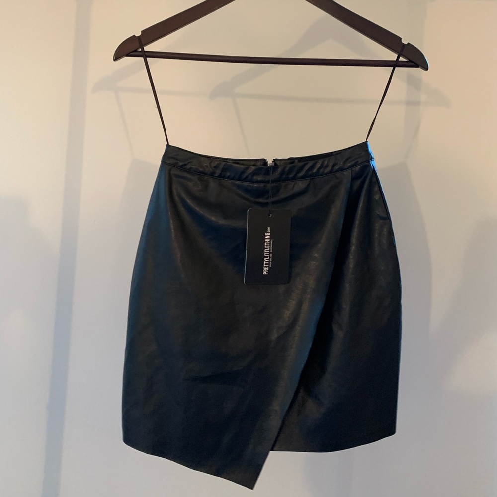 Black faux leather wrap mini skirt